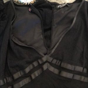 Little Black dress. Cap sleeves. Plunging neckline